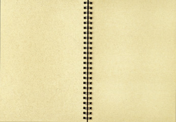 Obraz premium Book a brown paper with black wire in the middle.