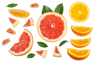 Sliced pieces of grapefruit, orange, lemon isolated on white, top view.