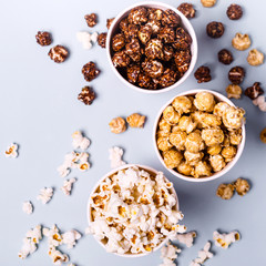 set of sweet and salted popcorn in paper cups