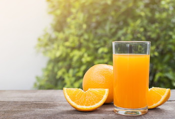 Orange and orange juice in the glass.