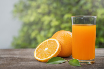 Orange and orange juice in the glass.