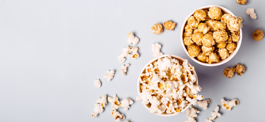 Sweet and salted popcorn on a blue background