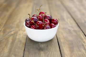 Cherries.  Cherry. Cherry in Minsk. Red cherry. Fresh cherries on wooden background. healthy eating concept.