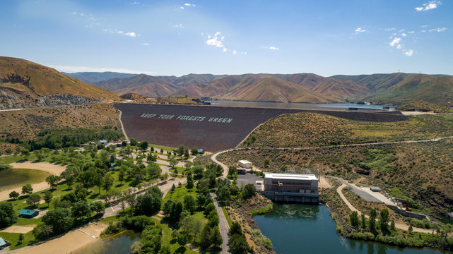 Aerial view of Luck Peak Dam on the Boise River Idaho with a park filled with trees