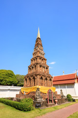 Ancient pagoda at Wat Phra That Haripunchai Woramahawihan in Lamphun, north of Thailand