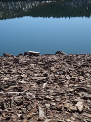 The calm blue waters of Ochoco Lake in Central Oregon on a sunny spring morning 
