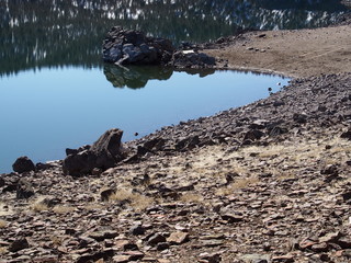 The calm blue waters of Ochoco Lake in Central Oregon on a sunny spring morning 