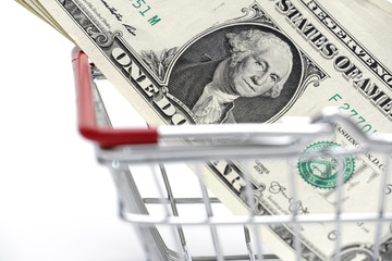 dollar money with Shopping Cart On White Background Shot In Studio