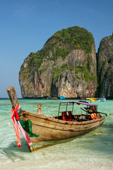 Longtail boat anchored at Maya Bay on Phi Phi Leh Island, Krabi Province, Thailand