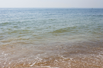 Soft wave of the sea on the sandy beach
