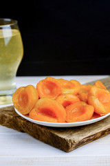 Fresh and fragrant slices of apricot on the table