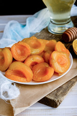 Fresh and fragrant slices of apricot on the table