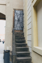 Steel old door with flattering in Prague