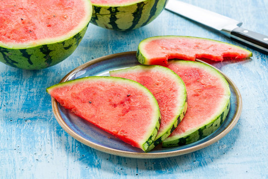 Slices of watermelon on a plate. Refreshing summer fruit