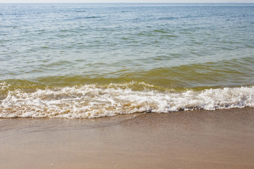 Soft wave of the sea on the sandy beach
