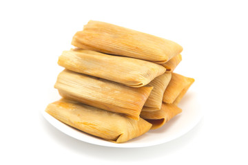 Homemade Wrapped Tamales Isolated on a White Background
