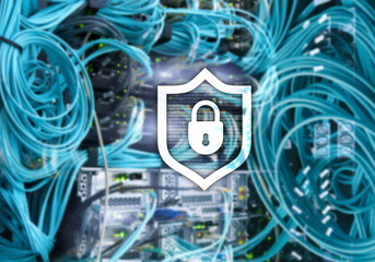 Cyber protection shield icon on server room background. Information Security and virus detection.