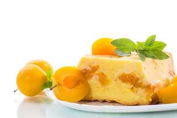 sweet curd casserole stuffed with yellow plums inside