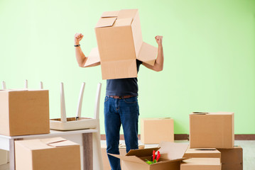 Man moving house with boxes