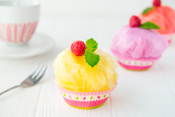 Concept of artificial, plastic food. GMO, E numbers and genetically modified sweets. Use of...