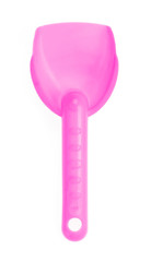 Small plastic toy shovel isolated on a white background.