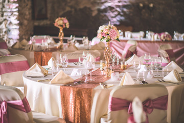 wedding table with exclusive floral arrangement prepared for reception, wedding or event...