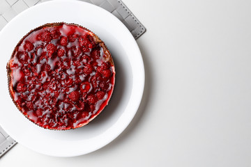 Raspberry jelly cake. Top view, flat, overhead. Copy space and text area. on white background