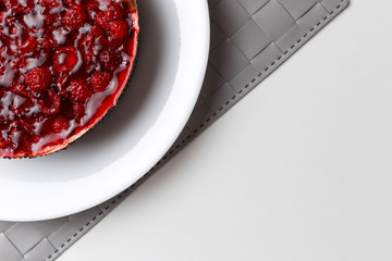 Raspberry jelly cake. Top view, flat, overhead. Copy space and text area. on white background