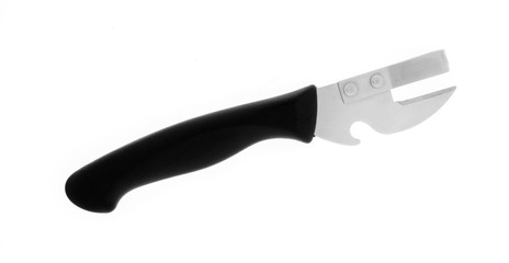 Old fashioned stab style tin, can opener isolated on white.