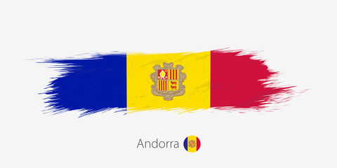 Flag of Andorra, grunge abstract brush stroke on gray background. - obrazy, fototapety, plakaty