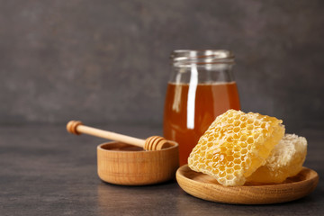 Composition with tasty fresh honeycombs on table