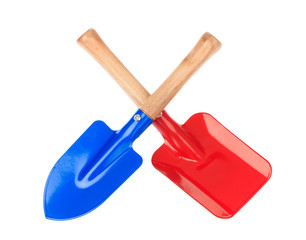 Red and Blue Steel shovel with a wooden handle isolated on a white background.