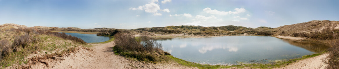 Fototapeta na wymiar Two dune lakes in the North Holland Dune Reserve - panorama