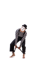 Fototapeta na wymiar Mime with his feet chained isolated on white