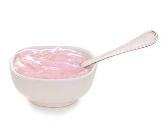 Skyr, healthy Icelandic food, raspoberry flavour in bowl, isolated on white. Similar to yogurt, it is a kind of cheese, a cultured dairy product.