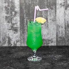Green cocktail with lemon