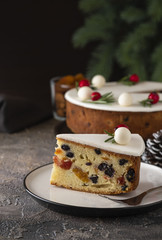 Christmas fruit cake, pudding on white plate. Copy space.