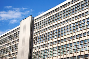 Fototapeta premium Industrial building facade with numerous rectangular windows