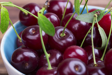 White plate of ripe cherries