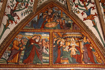 Fototapeta na wymiar Visitazione, natività e circoncisione di Gesù; affresco nella chiesa di San Pietro a Cembra