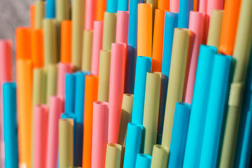 drinking straws closeup, colorful plastic straw macro