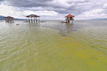 Balangay pump boats-native wooden stilthouses-Manjuyod White Sand Bar. Negros Oriental-Philippines. 0561