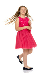 Elegant girl in a dress.