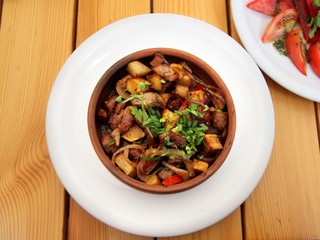 Ojakhuri with fried potatoes and meat - traditional georgian food