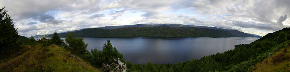 Blue lake among tranquil woods to relax with calm on vacation
