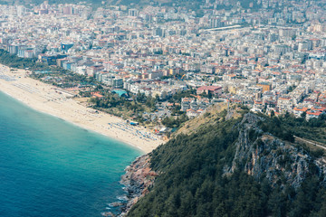 Fototapeta na wymiar View of the beach Cleopatra. Alanya, Turkey.Wonderful country.At home from a height. Roofs of buildings.View of the city.Observation deck.Mediterranean sea.