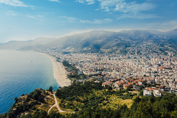 View of the beach Cleopatra. Alanya, Turkey. At home from a height. Roofs of buildings. View of the city.Observation deck.Mountains of Alanya. Mediterranean sea.Trail in the mountains.