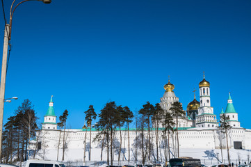 The fortress walls with towers around the New Jerusalem Monastery of the 17th century. Istra,...