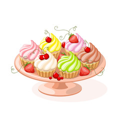 isolated plate with cupcakes and berries