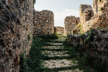 Fototapeta na wymiar Alanya Kalesi. Brick ancient castle wall. Alanya, Turkey. Wonderful country. Ruins of the fortress of Alanya. Brick road